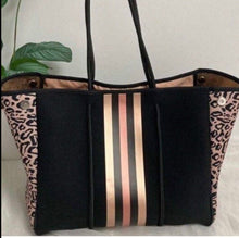 Load image into Gallery viewer, NWT © Onyx Leopard 2.0 black neoprene Tote w/ dark leopard & taupe sides + metallic gold and rose-gold racing stripes - bright gold lining