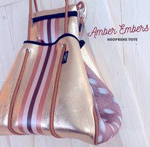 Load image into Gallery viewer, NWT © Amber Embers smooth blushed bronze lit metallic neoprene TOTE w auburn fawn snap sides + rouged amber & chocolate brown racing stripe
