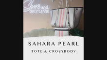 Load and play video in Gallery viewer, © Sahara Pearl waterproof tote &amp; crossbody sand beige premium neoprene + pearlescent &amp; sunset rose-gold stripes &amp; champagne mirage interior holiday gift ShoreAndSkyline
