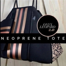 Load image into Gallery viewer, NWT © Onyx Leopard 2.0 black neoprene Tote w/ dark leopard &amp; taupe sides + metallic gold and rose-gold racing stripes ( bright gold lining )
