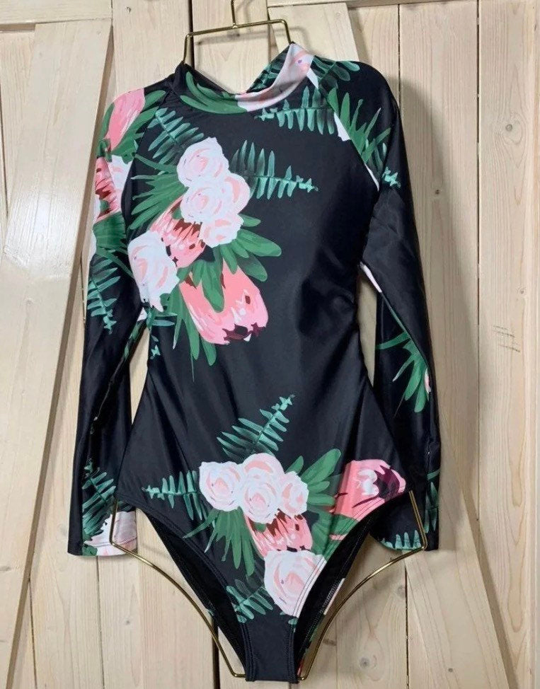 Rashguard Ebony & Peony black one-piece swimsuit + pink white peony florals